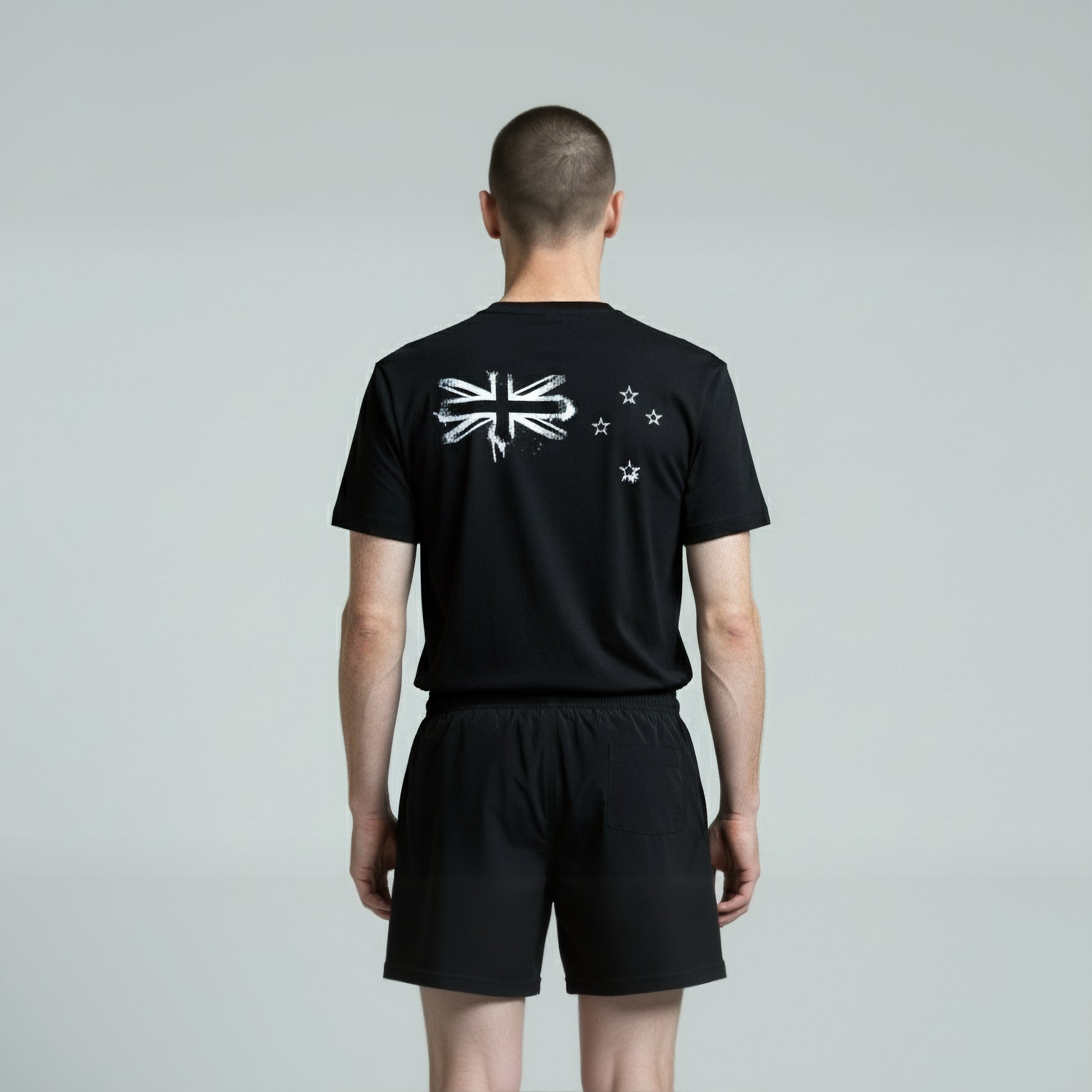 Back view of a man wearing Paul Coll 2026 team support squash shirt pre-sale – back NZ's finest on court with HUDL Athletica.  