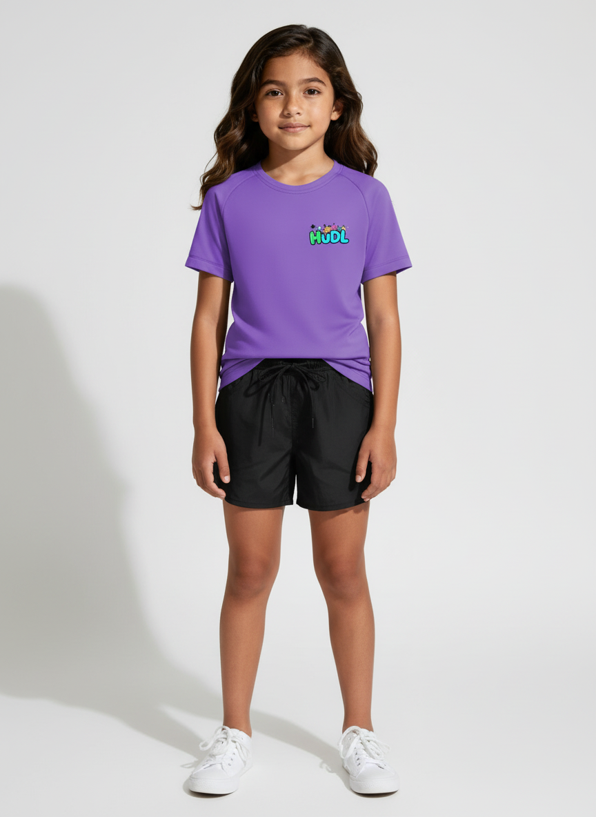 A young girl in a purple HUDL kids squash performance T-shirt – XTPro fabric, wicking and light weight, junior fit