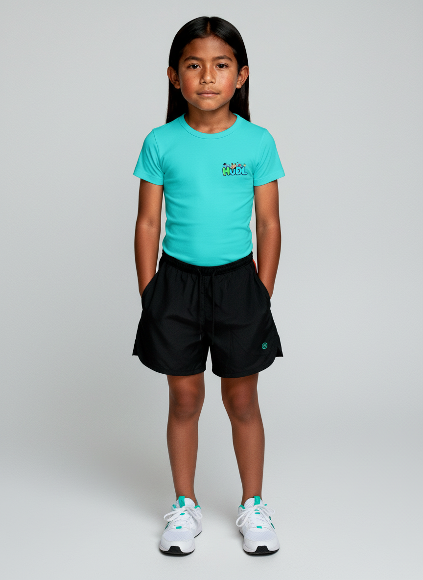 A young boy in a teal HUDL kids squash performance T-shirt – XTPro fabric, wicking and light weight, junior fit