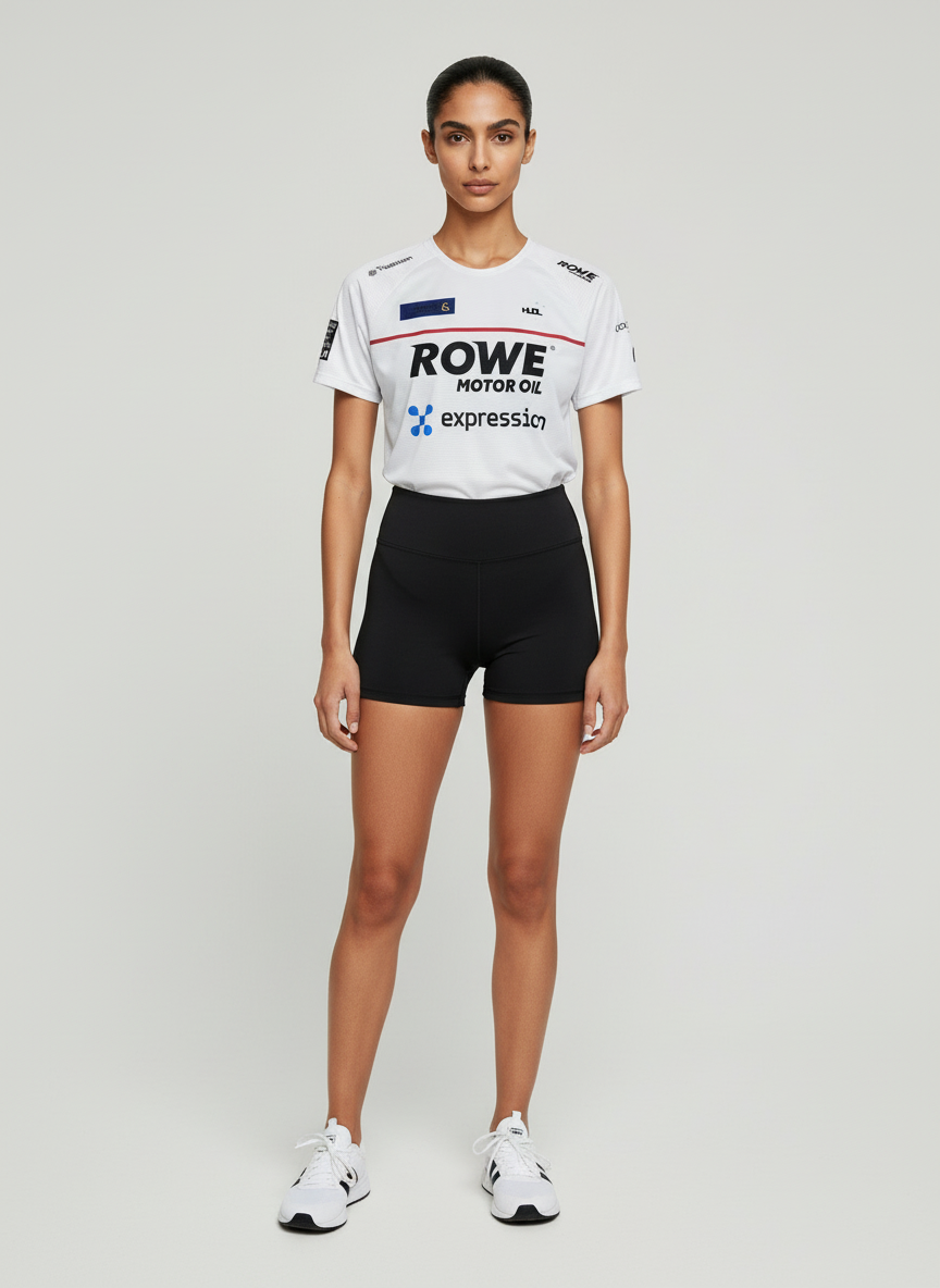 A woman standing  wearing HUDL women's squash biker shorts – XTPro fabric  high-performance fit also wearing the White Paul Coll Tournament T shirt