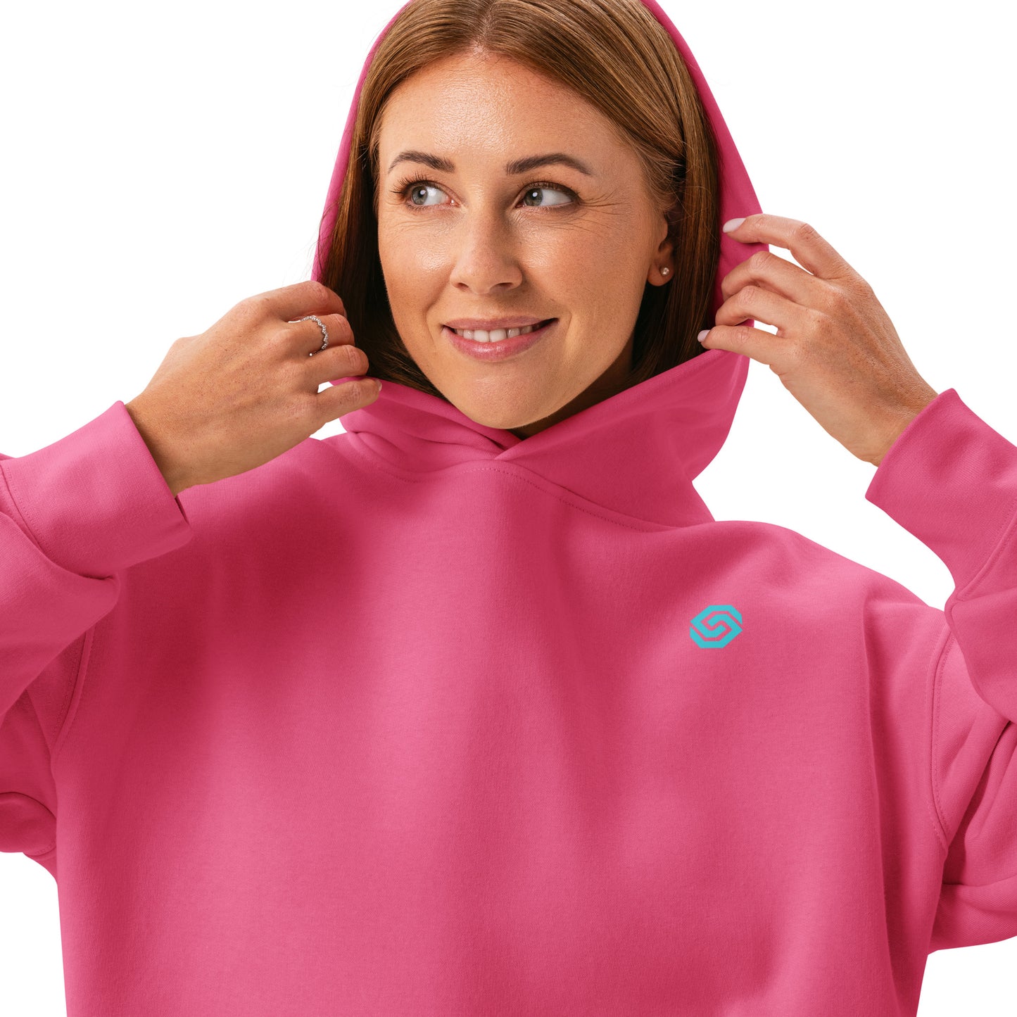 A close up of a woman standing wearing a HUDL women's relaxed fit pullover hoodie – off-court squash style, embroidered logo in charity pink