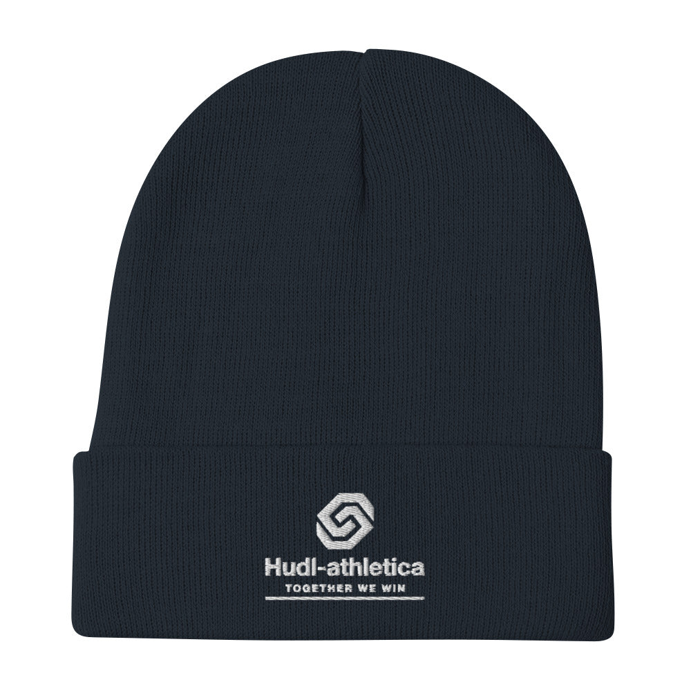 A man wearing a HUDL embroidered knit beanie – squash community streetwear, warm and stylish off-court in navy