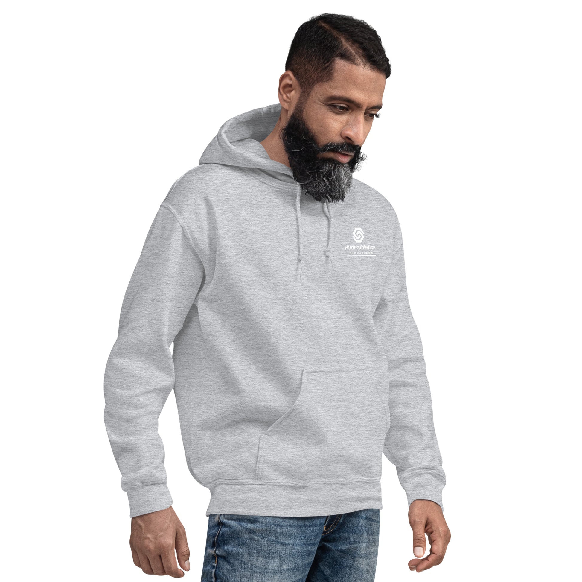 A man wearing a HUDL unisex pullover fleece hoodie – squash off-court essential, embroidered HUDL logo in light grey heather 